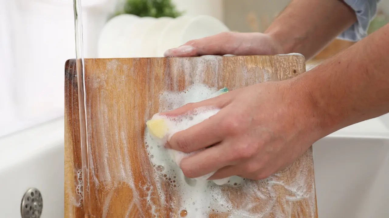 A man washes a board